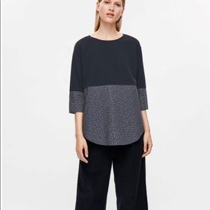 COS jumper with shirt hem